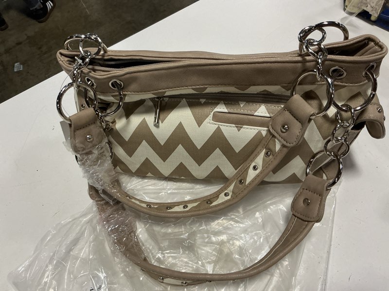 Condition photo showing Good Condition for tan & white satchel purse - nwot