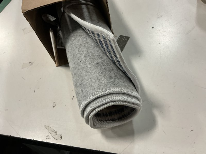 Condition photo showing As Is for Dash and Albert Malta Blue Machine Washable Area Rug - 2' x 3' Blue Stripe Washable Accent Rug - Durable, High Traffic Areas Kitchen, Mudroom, Hallways Malta Blue 2' x 3' (Rectangular)