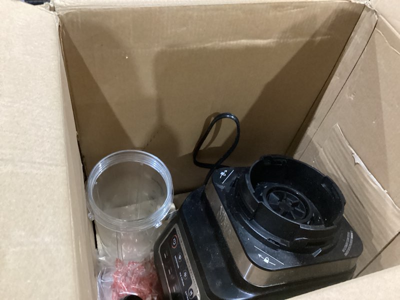 Condition photo showing As Is for ninja bn751 professional plus duo blender, 1400 peak watts, 3 auto-iq programs for smoothies, frozen drinks & nutrient extractions, 72-oz. total crushing pitcher & (2) 24 oz. to-go cups, black 72 oz. blender + 24 oz. cups