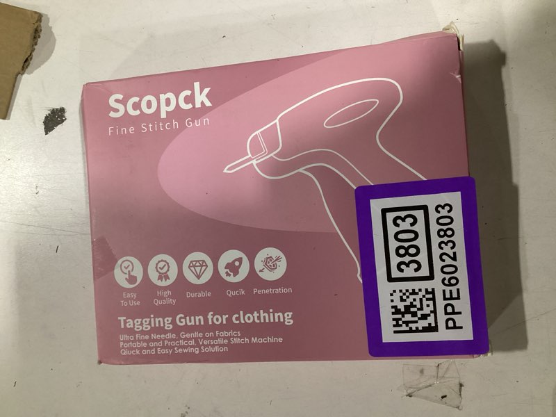 Condition photo showing As Is for stitch gun for clothes - handheld stitch gun quick clothing fixer - tagging gun - includes 6 needle, 1000 black fasteners & 1000 white fasteners (pink/orange)