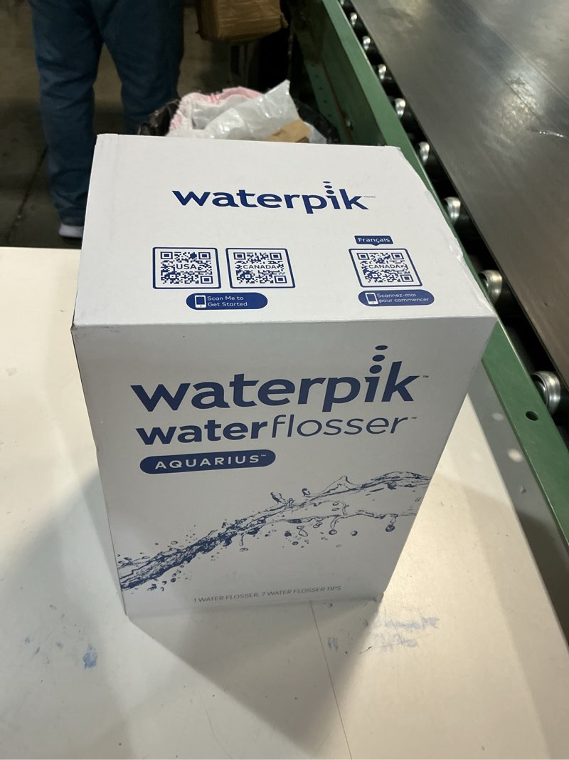 Condition photo showing New/Like New for Waterpik Aquarius Water Flosser For Teeth Cleaning, Gums, Braces, Dental Care, Electric Power With 10 Settings, 7 Tips For Multiple Users And Needs, ADA Accepted, Gray WP-667, Packaging May Vary