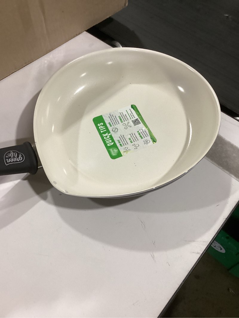 Condition photo showing As Is for **SIMILAR TO* **AS IS** ( large pan is slightly damaged) GreenPan Dover 8” and 10” 2 Piece Frying Pan Skillet Set, Non-Toxic PFAS-Free Ceramic Nonstick Coating, Sear Saute Fry Egg Omlete, Dishwasher & Oven Safe, Stay Cool Handle, Easy Pour Rims, Black