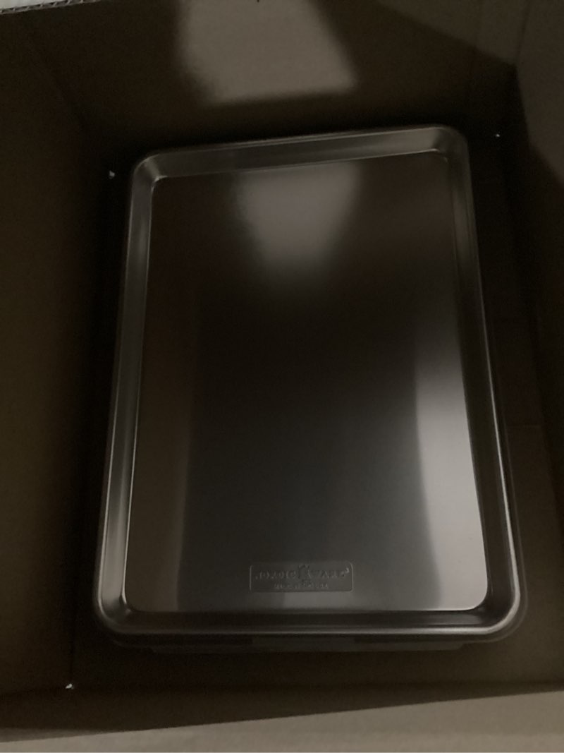 Condition photo showing As Is for Nordic Ware Naturals Half Sheet Set - USA Made Aluminum Commercial Quality Sheet Pan for Baking or Roasting, Encapsulated Galvanized Steel Rim Prevents Warping, 2pk Half + Lid