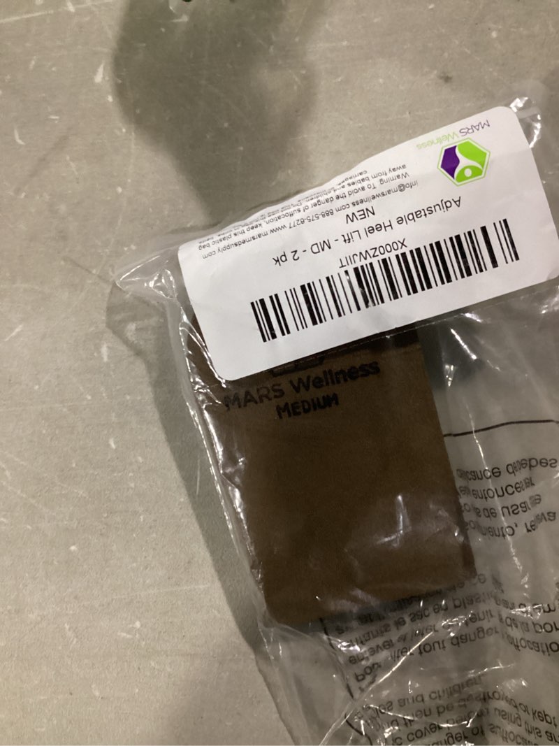 Condition photo showing Good Condition for Premium Adjustable Orthopedic Heel Lift - Made in The USA - for Heel Pain and Leg Length Discrepancies - Medium Pack of 2 Brown Brown Medium (Pack of 2)