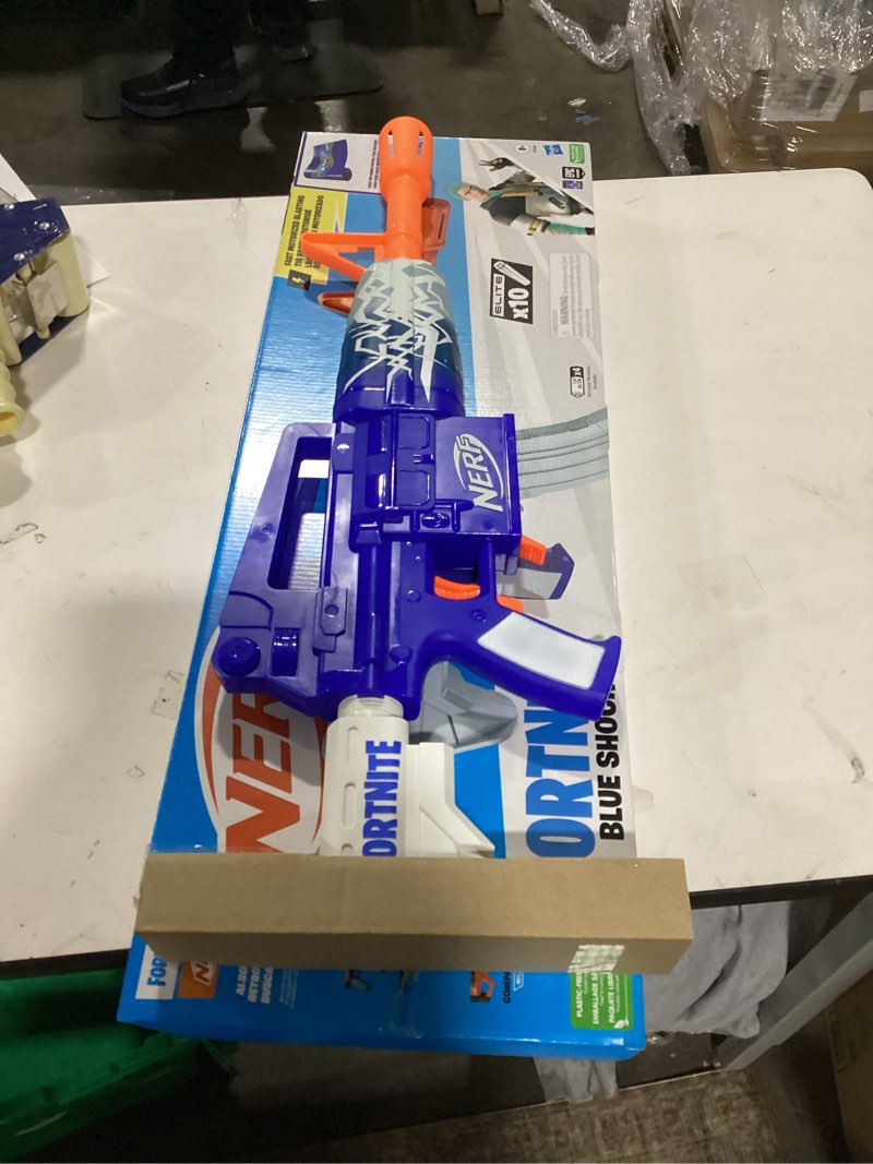 Condition photo showing Good Condition for Nerf Fortnite Blue Shock Blaster, 10-Dart Clip, 10 Elite Nerf Darts, Includes Bonus Code to Unlock The Beat Wrap in The Game, Motorized Dart Blaster