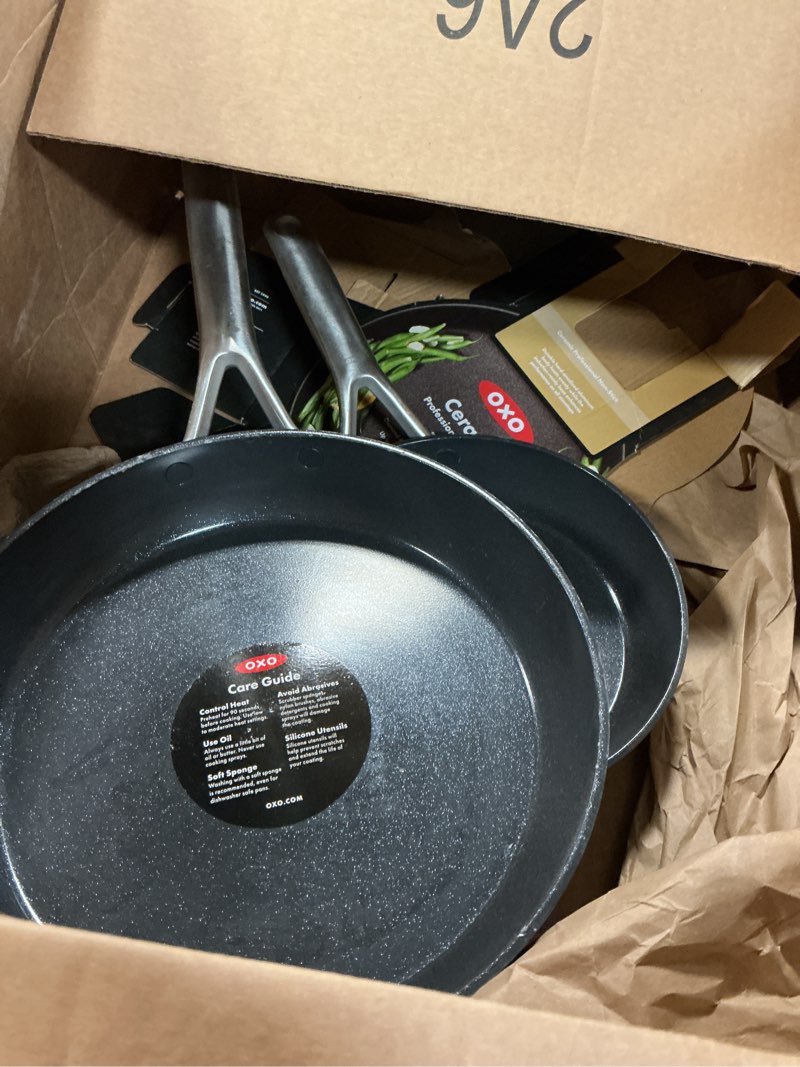 Condition photo showing As Is for oxo professional 8" and 10" frying pan skillet set, hard anodized ceramic nonstick cookware pfas-free, stainless steel, induction suitable, diamond reinforced coating, dishwasher and oven safe, black
