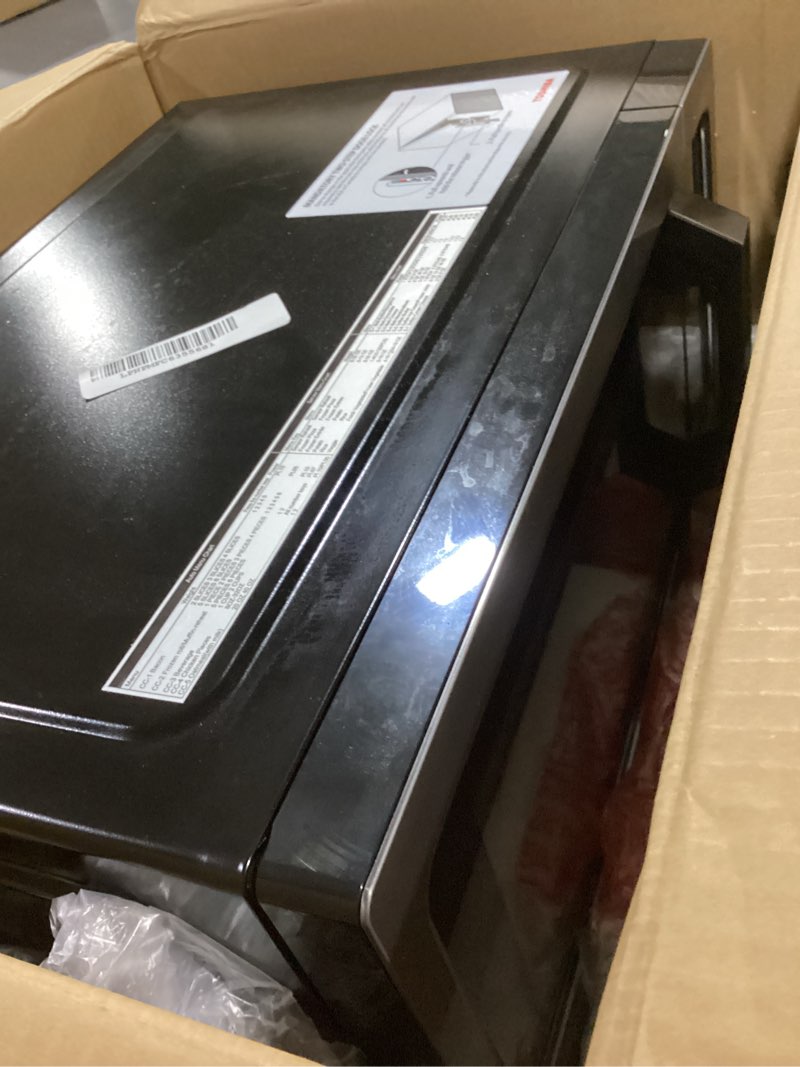 Condition photo showing As Is for TOSHIBA EM131A5C-BS Countertop Microwave Ovens 1.2 Cu Ft, 12.4" Removable Turntable Smart Humidity Sensor 12 Auto Menus Mute Function ECO Mode Easy Clean Interior Black Color 1000W 1.2 Cu.Ft. Black
