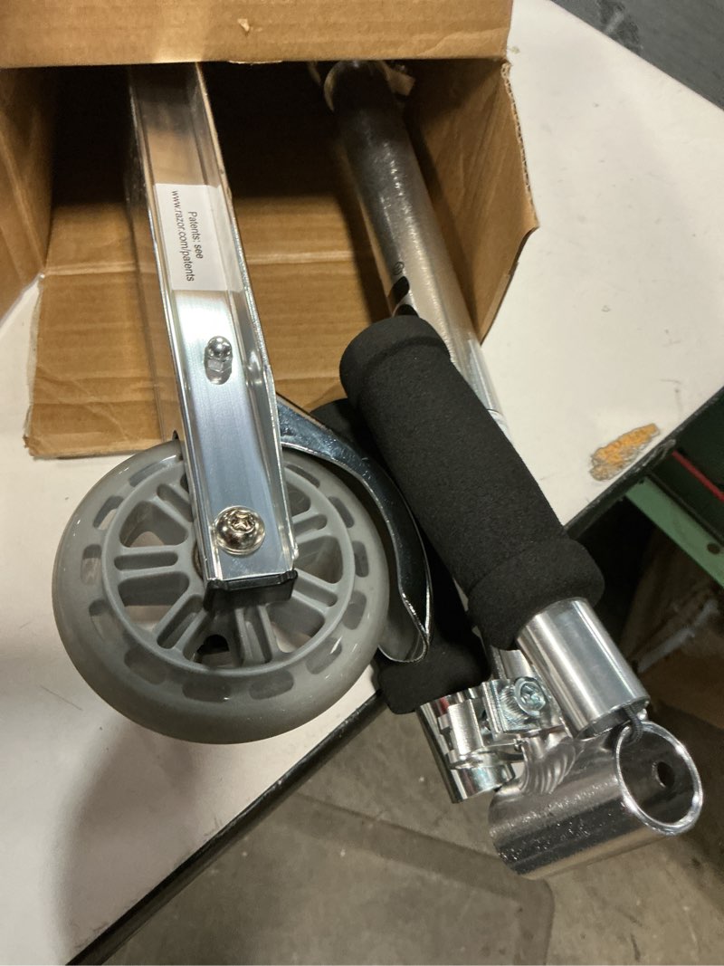 Condition photo showing As Is for Razor A Kick Scooter for Kids - Lightweight, Foldable, Aluminum Frame, and Adjustable Handlebars Clear/Black