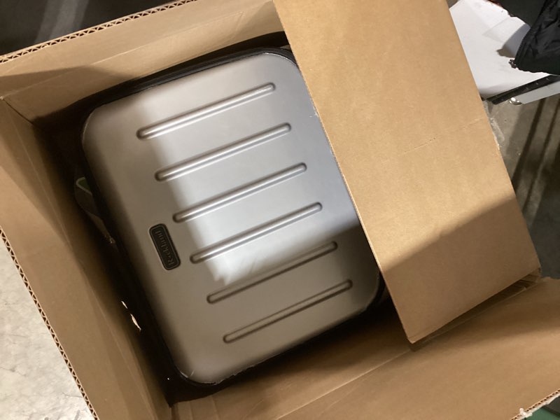 Condition photo showing Good Condition for Rockland Revolution Hardside Rolling Computer Case, Silver, Carry-On 17-Inch Small Silver