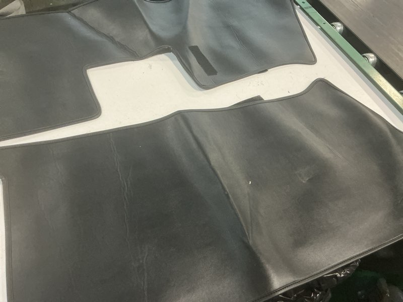 Condition photo showing As Is for rubber floor mats