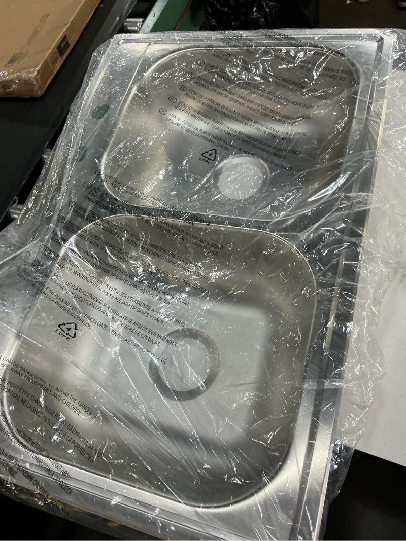 Condition photo showing New/Like New for elkay dayton drop-in 33-in x 22-in stainless steel double equal bowl 22 -gauge kitchen sink
