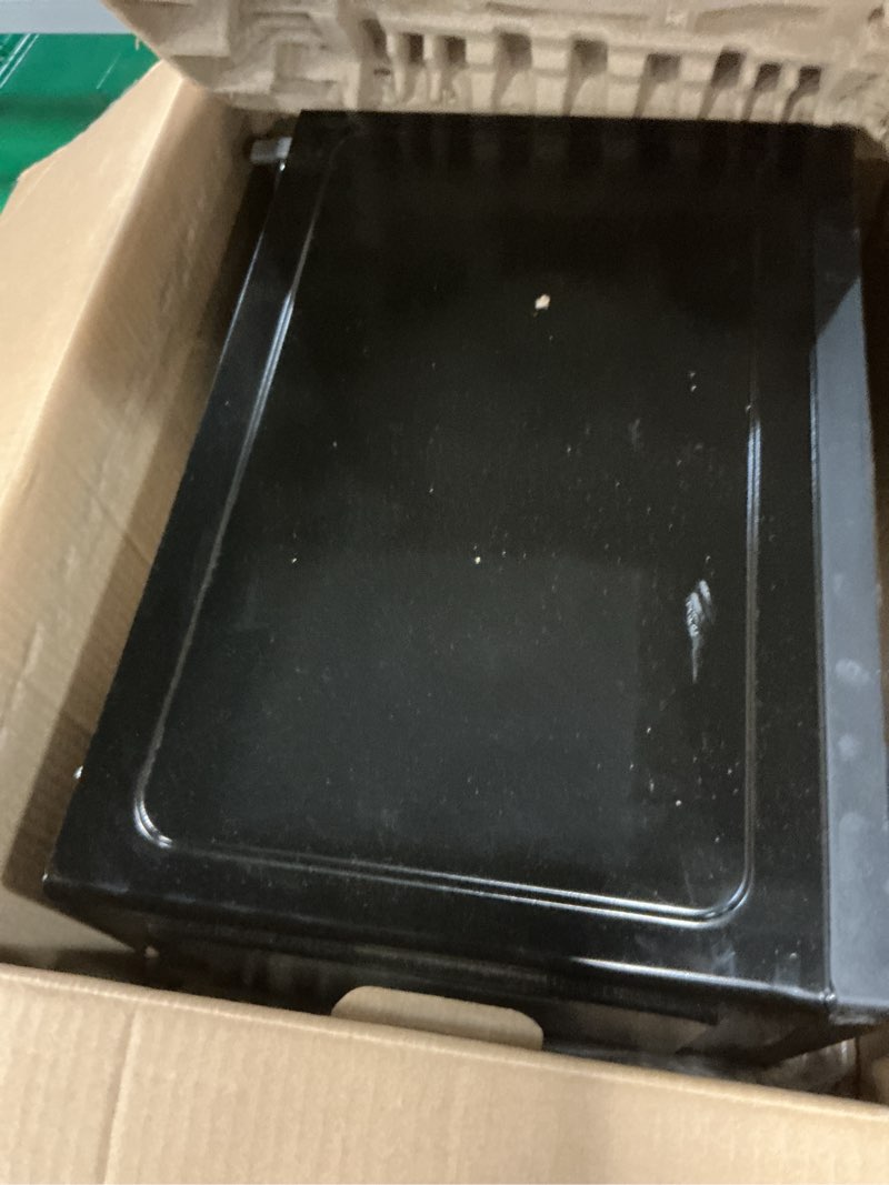 Condition photo showing As Is for mainstays 1.1 cu ft microwave oven in black