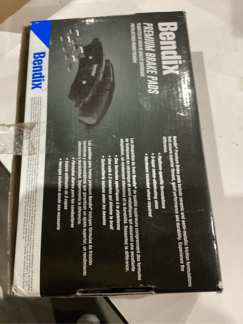Condition photo showing As Is for Bendix Premium SBC1589 Ceramic Front Brake Pads for Select Models Chrysler Grand Caravan, Pacifica, Town & Country, Voyager, Dodge Journey, Jeep Gladiator, Wrangler, Ram C/V, Volkswagen Routan