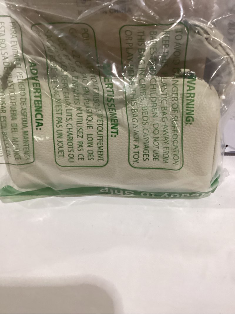 Condition photo showing Good Condition for beige purse clutch