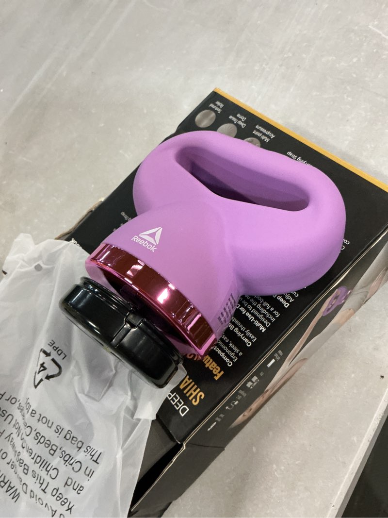 Condition photo showing Good Condition for reebok deep-rolling shiatsu massager  4 intensity levels  3 massage heads  comfort grip  purply pink  relieves muscle tension  promotes relaxation