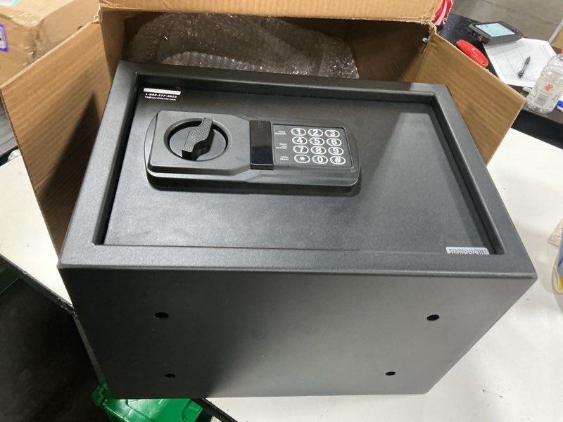 Condition photo showing As Is for pen + gear safes model 44e20 with electronic lock, backup key, 1 shelf, black