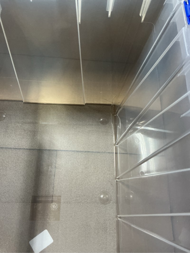 Condition photo showing As Is for Akro-Mils 66486 12-Gallon Plastic Stackable Storage KeepBox: Tote Container with Attached Hinged Lid, 21-1/2-Inch x 15-Inch x 12-1/2-Inch, Clear/Blue