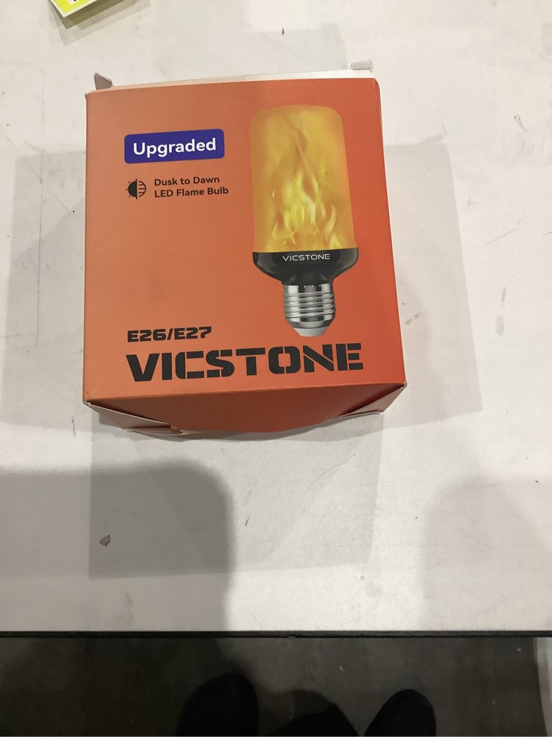 Condition photo showing New/Like New for Vicstone Dusk to Dawn LED Flame Light Bulbs Outdoor, 4 Modes Flickering Light Bulbs with Upside Down Effect, E26 Fire Bulb for Halloween Christmas Party Patio Porch Home Indoor Decorations - 2 2 Pack