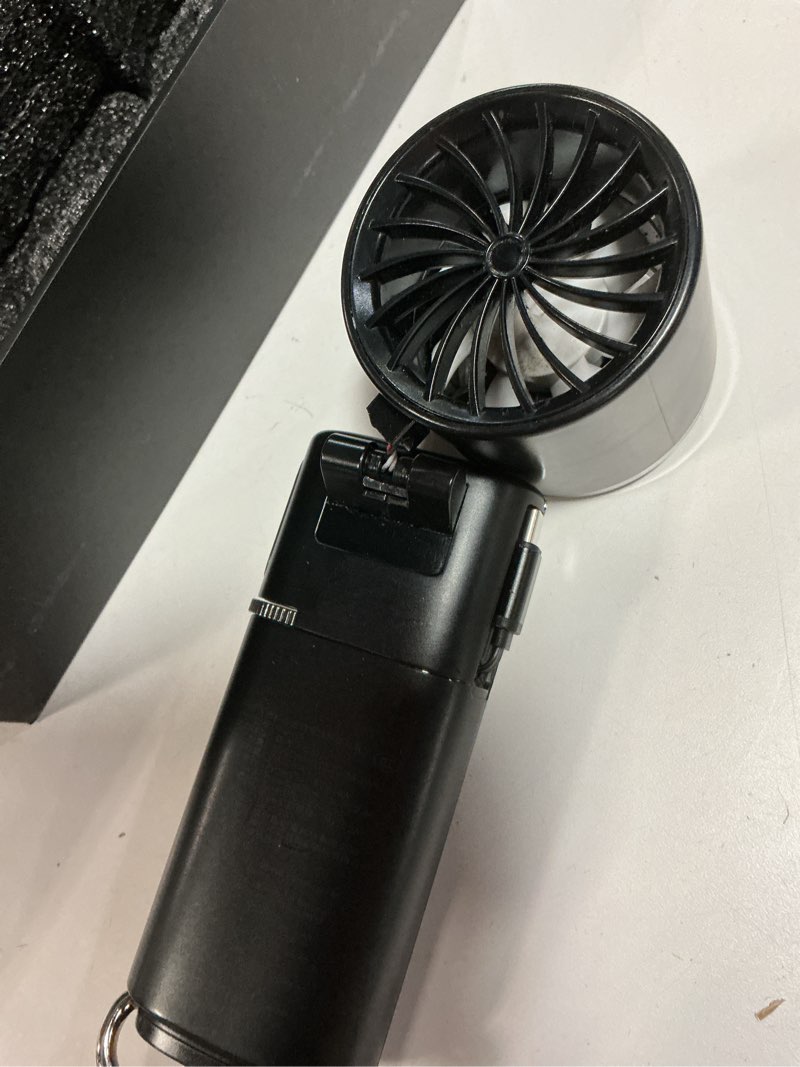 Condition photo showing As Is for portable handheld turbo fan with ice cooling, 9000mah rechargeable personal fan, 100-speed wind, built-in type-c cable, led display,135° tilt foldable for desk/neck/travel-black