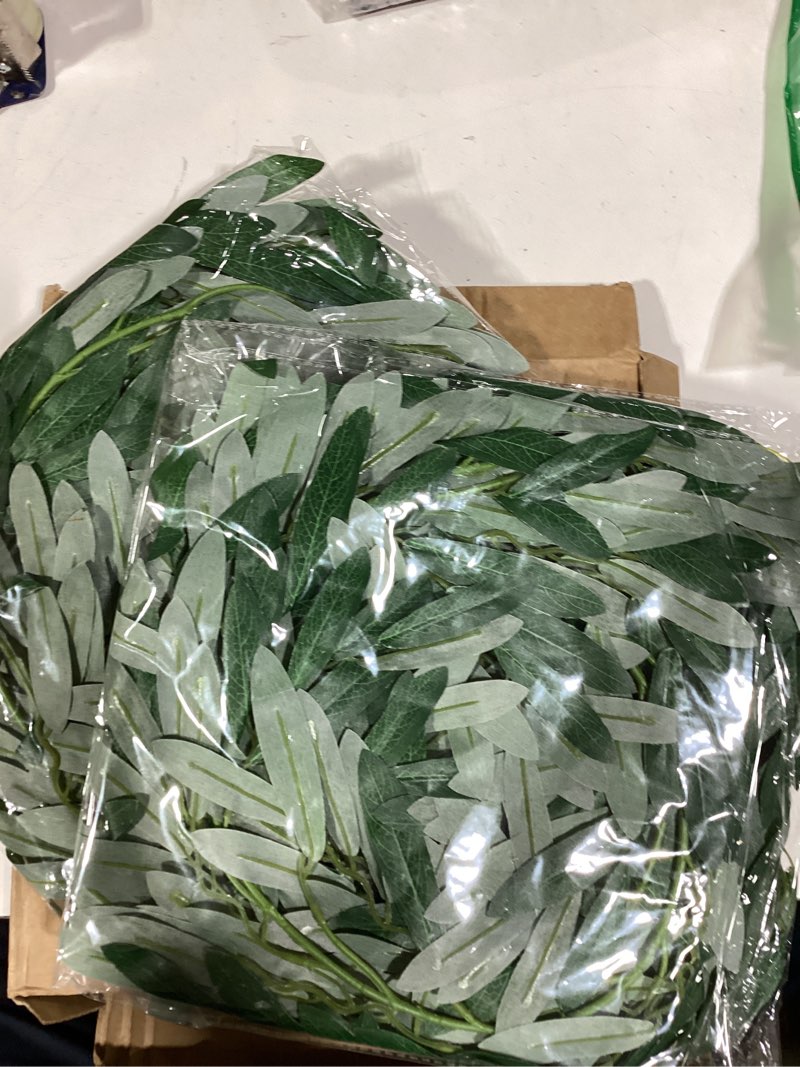 Condition photo showing Good Condition for 3 strands odorless artificial olive leaf vines, 73'' silk ivy vine garland with green leaves, fake hanging plants greenery decor for home, bedroom, wall, party, wedding decoration. green 4