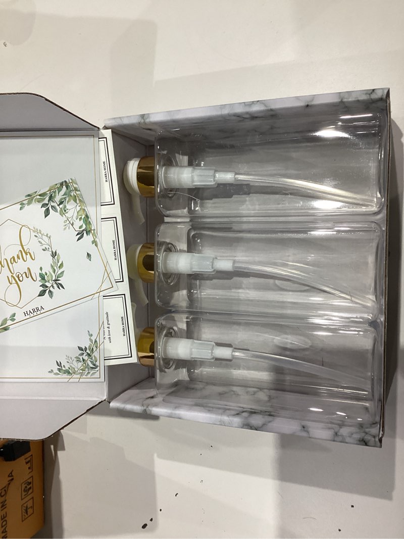 Condition photo showing Good Condition for Modern Gold Design Shampoo and Conditioner Dispenser, Large 27oz Shower Soap Dispenser, Set of 3 Refillable Empty Plastic Pump Bottles for Bathroom, 6 Waterproof Labels Included, (Clear & White)