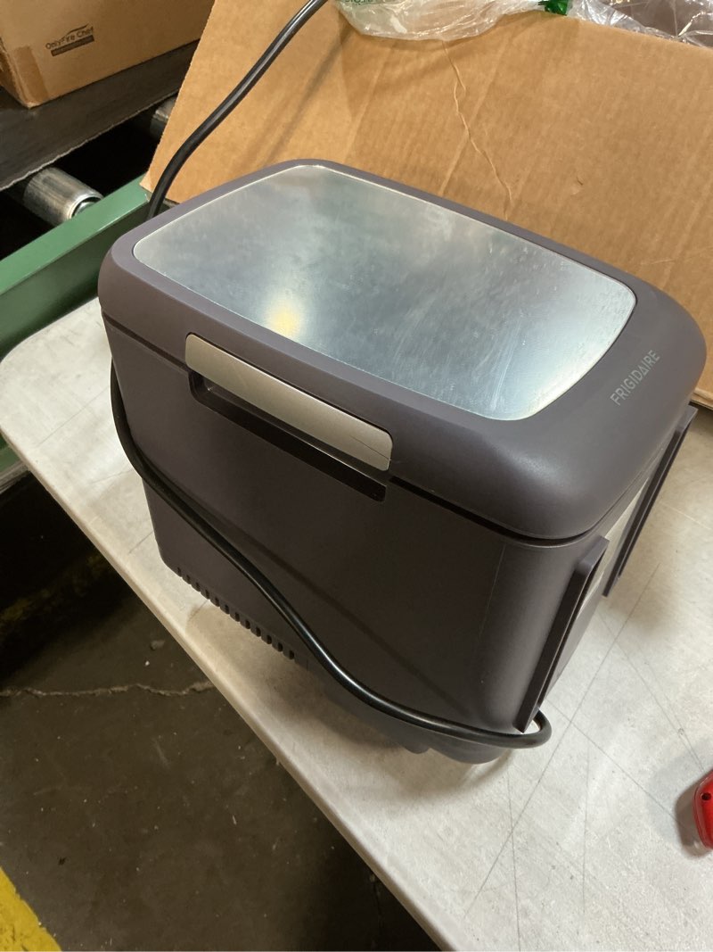 Condition photo showing As Is for Frigidaire 6-Can Retro Gaming Light-up Portable Beverage Mini Fridge, EFMIS179 (Stealth), EFMIS179-STEALTH-CP4