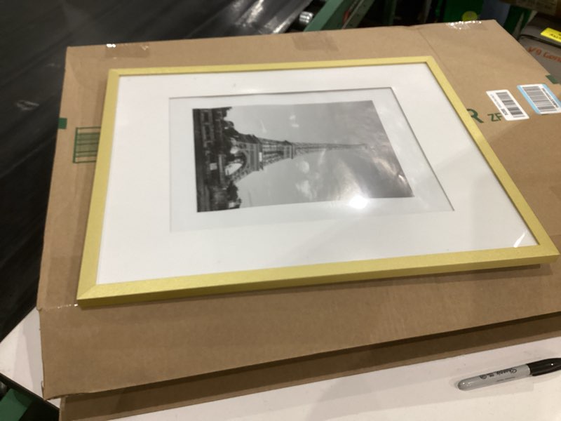 Condition photo showing Good Condition for upsimples 16x20 Picture Frame, Display Pictures 11x14 with Mat or 16 x 20 Without, Wall Hanging Poster Frame, Gold, 1 Pack Gold 16x20