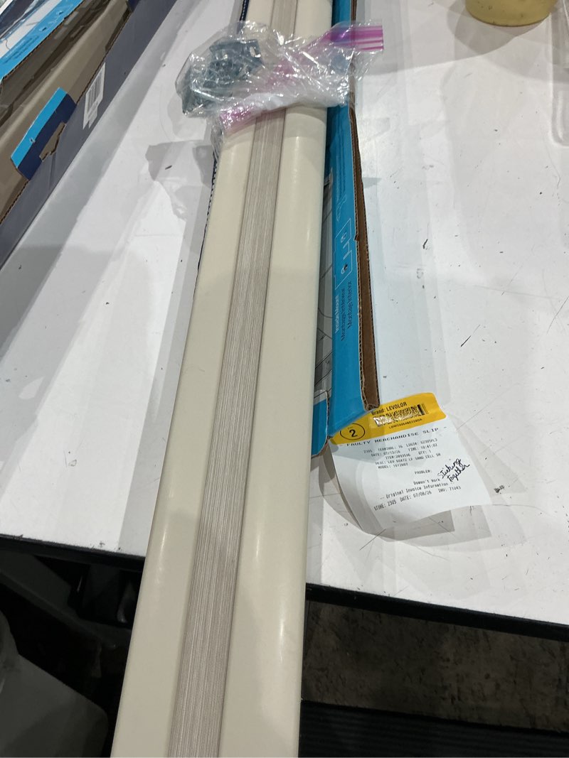 Condition photo showing As Is for levolor  trim+go 60-in x 72-in sand light filtering cordless cellular shade  993 