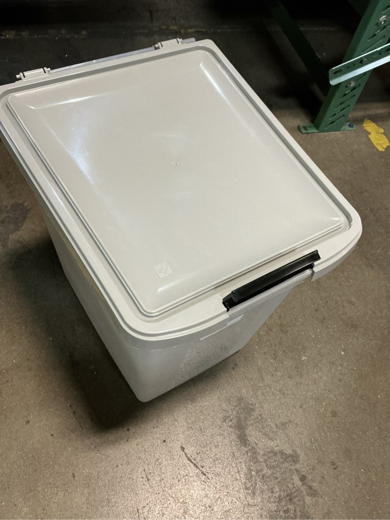 Condition photo showing As Is for amazon basics airtight pet food storage container with scoop, bpa free, removable wheels, 69 qt, gray