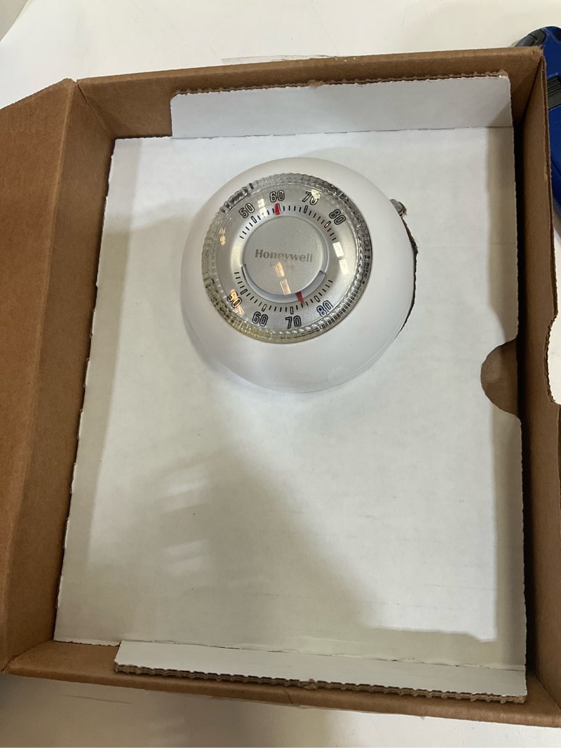 Condition photo showing As Is for honeywell home heating and cooling dial thermostat