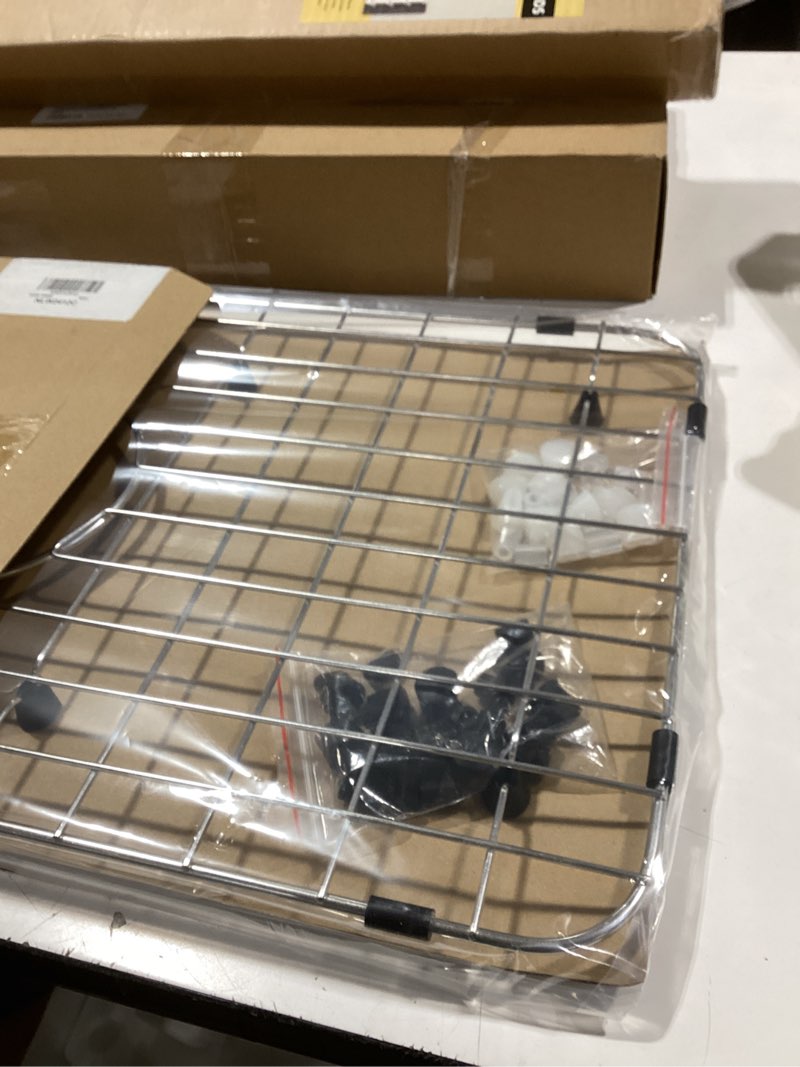 Condition photo showing New/Like New for Serene Valley Sink Bottom Grid 24-1/8" x 12-5/8", Centered Drain with Corner Radius 1-1/2", Sink Protector NLW2412C