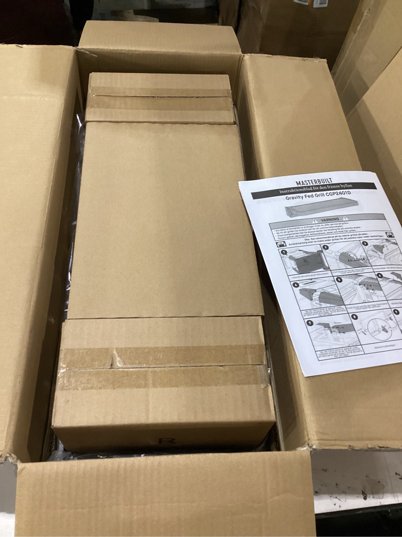 Condition photo showing New/Like New for Masterbuilt® Gravity Series 560 Digital Charcoal Grill and Smoker Powder-Coated Steel Font-Shelf Accessory Insert to Hold up to 50LBS in Black, Model MB20181522