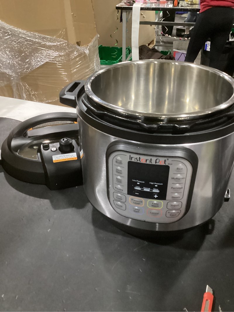 Condition photo showing As Is for instant pot duo 7-in-1 electric pressure cooker, slow cooker, rice, steamer, sauté, yogurt maker, warmer & sterilizer, includes app with over 800 recipes, stainless steel, 6 quart 6 quarts