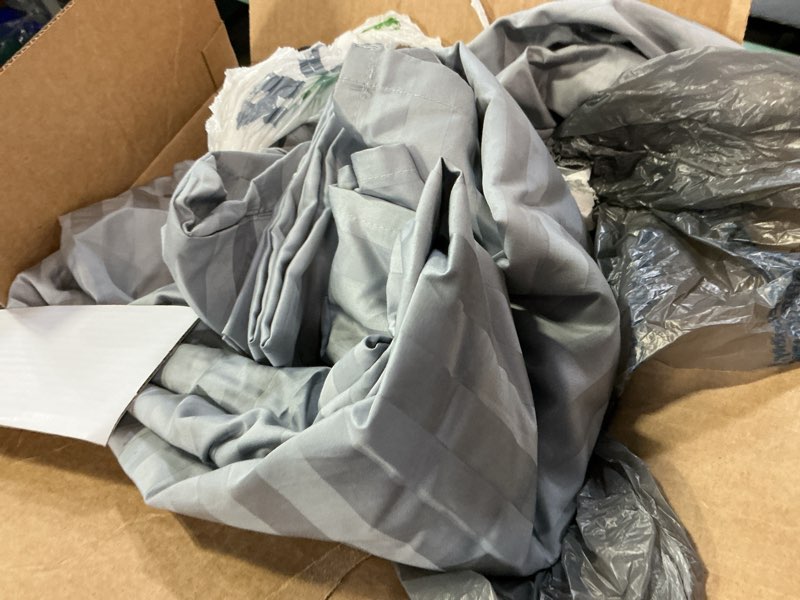 Condition photo showing As Is for boll & branch signature hemmed cal king set + king pc- shore 100% o cotton