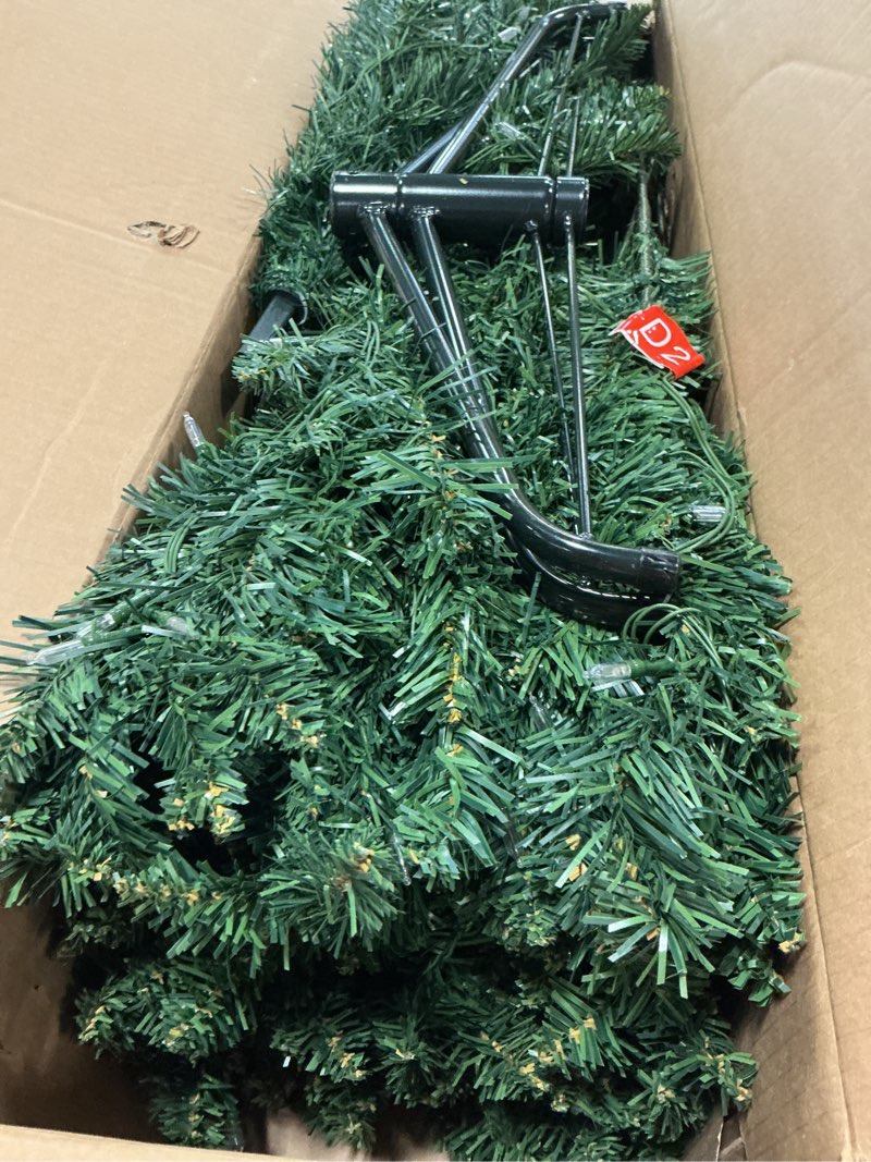 Condition photo showing Good Condition for 6 FT Pre-lit Christmas Tree, Artificial Pine Spruce Christmas Tree 980 PVC Branch Tips 300 Warm White Lights, Easy Assembly with Metal Stand and Hinged Branches Decoration Warm White 6ft