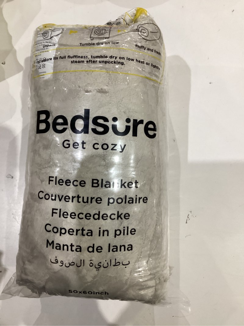 Condition photo showing New/Like New for Bedsure GentleSoft Beige Throw Blanket for Couch - Cozy Soft Blankets for Women, Cute Small Fleece Throws for Girls, 300GSM, 50x60 Inches Beige Throw (50" x 60")