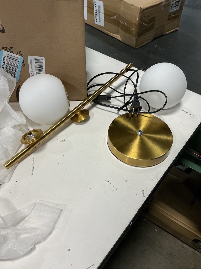Condition photo showing As Is for staggered glass 2-light plug-in sconce (40\")(unknown size)