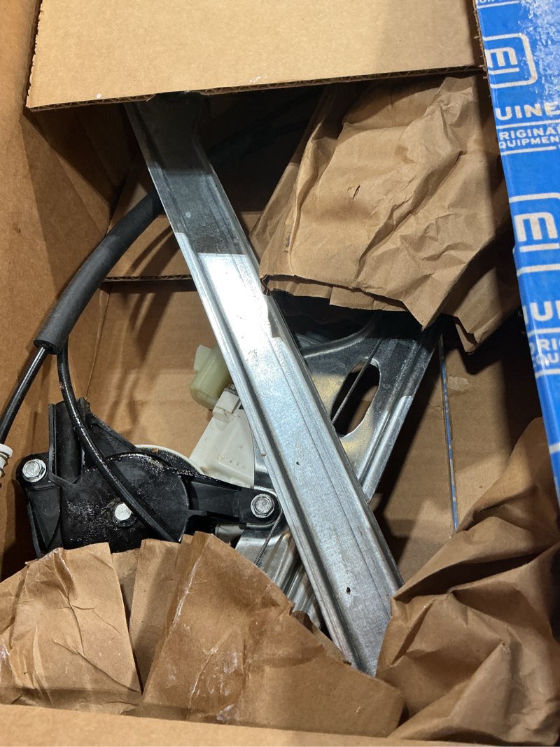 Condition photo showing As Is for gm genuine parts 20945138 front driver side window regulator with motor