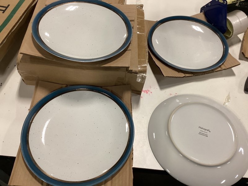 Condition photo showing New/Like New for pfaltzgraff ezra blue 4pc dinner plates