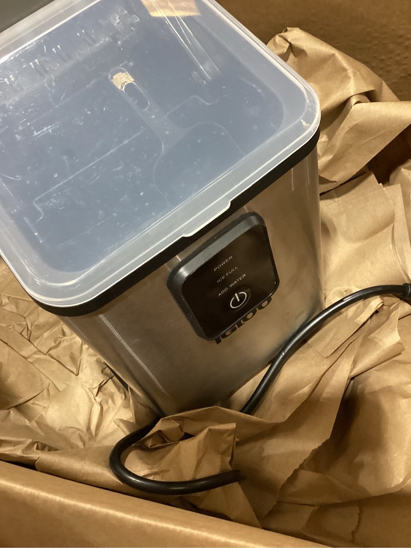 Condition photo showing As Is for igloo portable ice maker with scoop - countertop ice maker with led control panel & 1.5 quart water tank - ice cube maker produces 26 lbs. of ice in 24 hours with 9 large or small cubes in 7 minutes stainless steel 26 lb