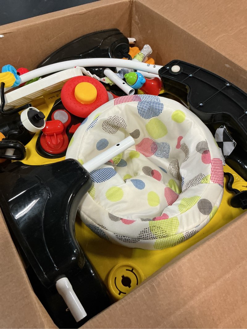 Condition photo showing Good Condition for dream on me champ activity center and jumper in yellow