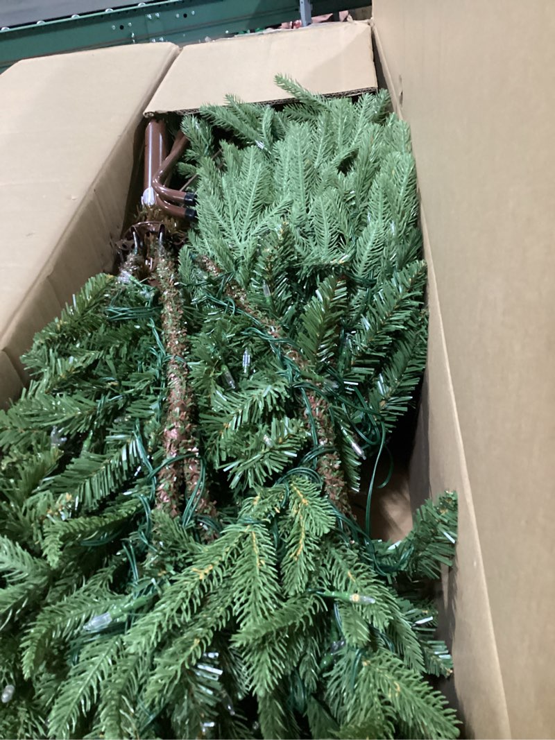 Condition photo showing Good Condition for National Tree Company 6 ft Pre-lit Artificial Christmas Tree, North Valley Spruce, 300 Clear Lights, Hinged Branches, 800 Branch Tips, Includes Stand, Green