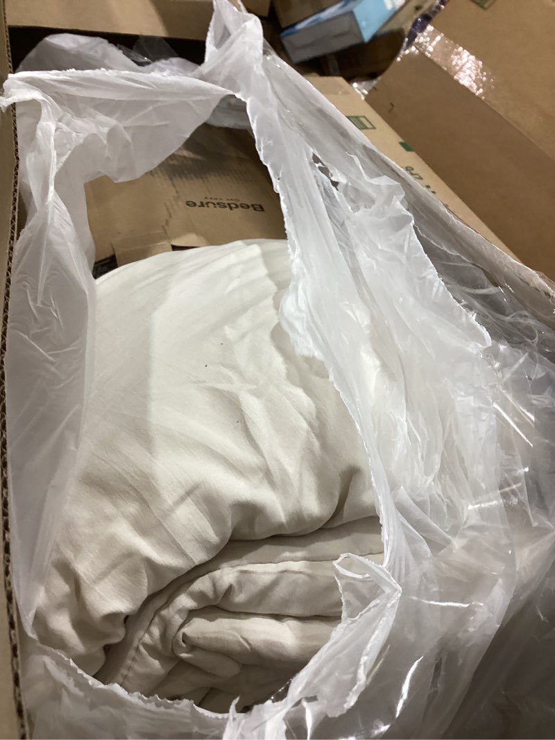 Condition photo showing As Is for bedsure oversized king comforter set, beige soft prewashed bedding for all seasons, 3 pieces gentlesoft™ bed set, 1 lightweight comforter (120"x98") and 2 pillowcases (20"x36")
