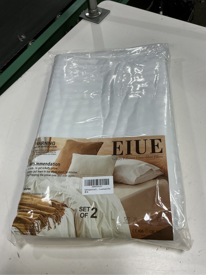 Condition photo showing New/Like New for 2 pack EIUE Throw Pillow Inserts, Machine Washable Pillows,Premium Polyester Fiber Fill for Sofa Bed & Decorative Cushions (White, 20x20inch) White 20x20inch