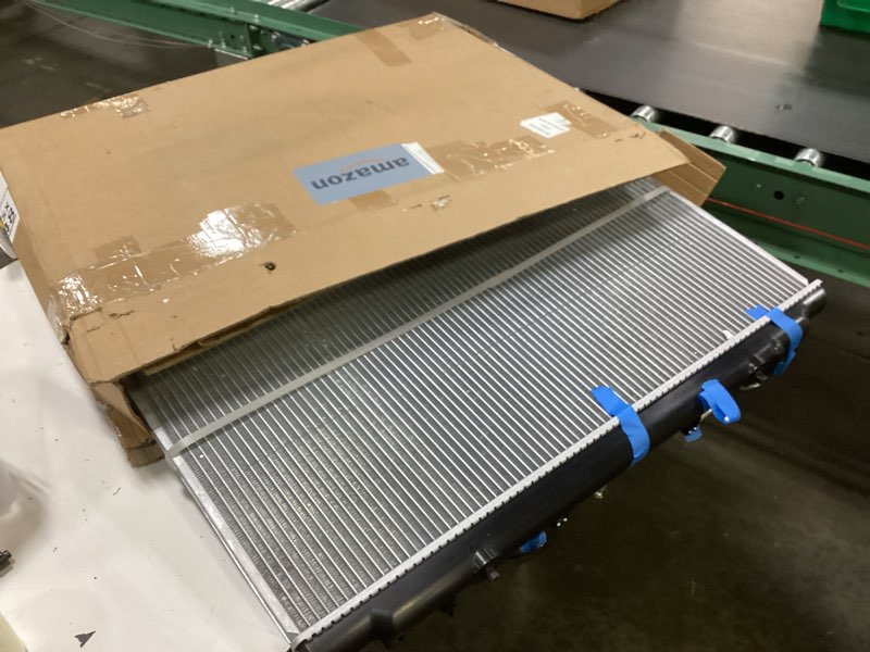 Condition photo showing As Is for a-premium engine coolant radiator assembly - with transmission oil cooler - compatible with toyota sienna 2005 2006 v6 3.3l