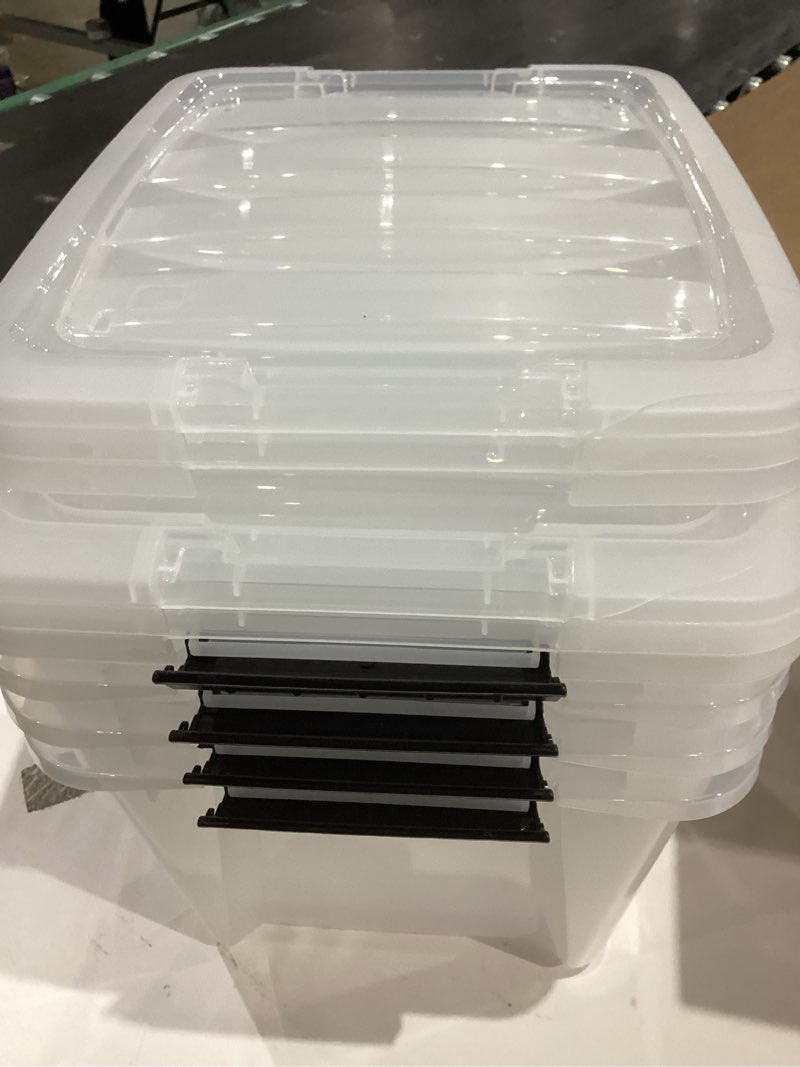 Condition photo showing As Is for 34l clear plastic storage box with lid, stackable container with wheels and secure locking buckles, 4 pack