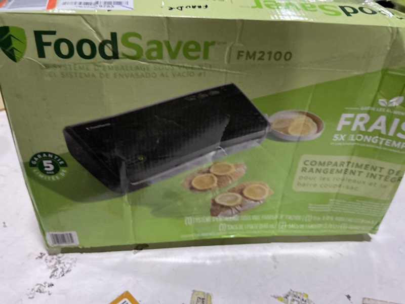 Condition photo showing Good Condition for FoodSaver Vacuum Sealer Machine, Automatic Bag Detection, Sous Vide Friendly, with sealer bags, roll, handheld vacuum sealer, black Vacuum Sealer + Accessories