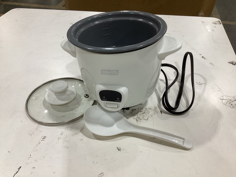Condition photo showing As Is for dash mini ceramic rice cooker - designed for single-serve cooking - compact rice cooker with nonstick removable pot, keep warm function & easy-to-clean sleek design - white ceramic mini rice cooker with keep warm white ceramic