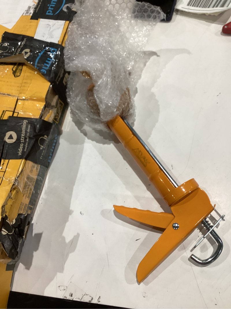 Condition photo showing As Is for (incomplet)dewalt 20v max caulking gun, cordless, 10oz, variable speed trigger, interchangeable canister trays, bare tool only (dce560b)