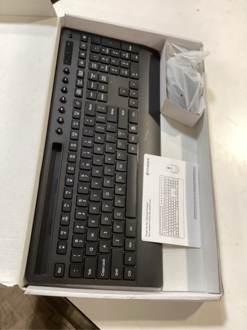 Condition photo showing Good Condition for trueque km31 wireless keyboard and mouse combo - full-size quiet typing with palm rest, phone holder, multimedia keys, power switch, batteries included, compatible with windows, chrome os, pc, laptop black
